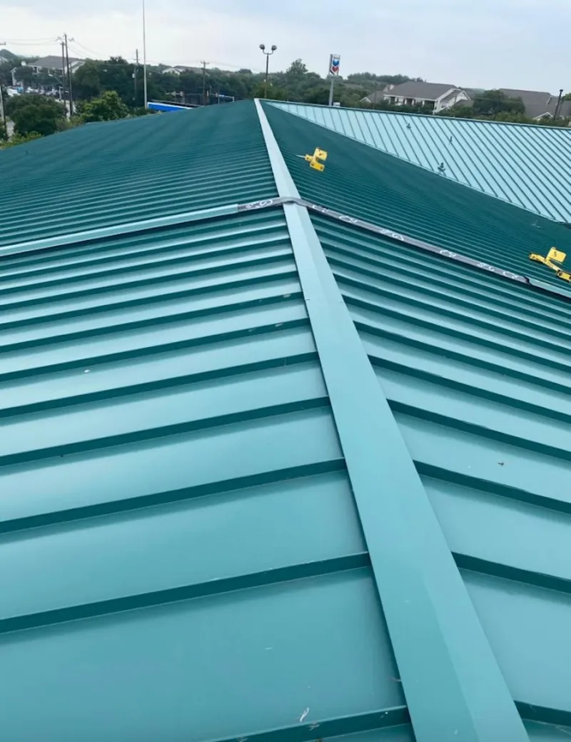 Green commercial metal roof ridge and valley for Metal Roof Repair in Ashland